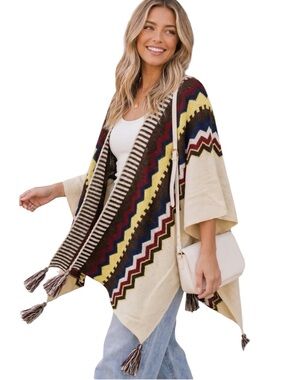 515: KYE MI NWT TASSEL PONCHO IVORY (H38)
